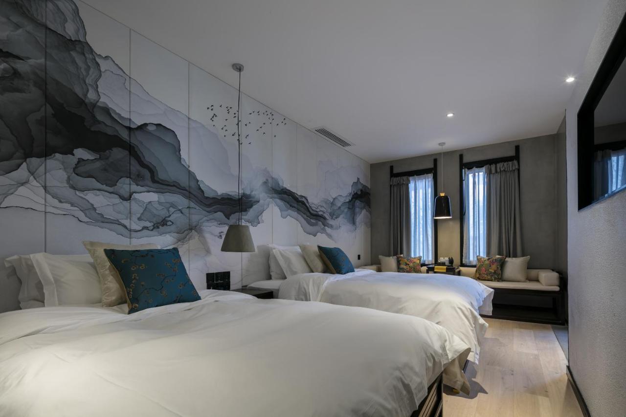 Lijiangl Hotel Liman Shenmiji Inn 麗江市 エクステリア 写真