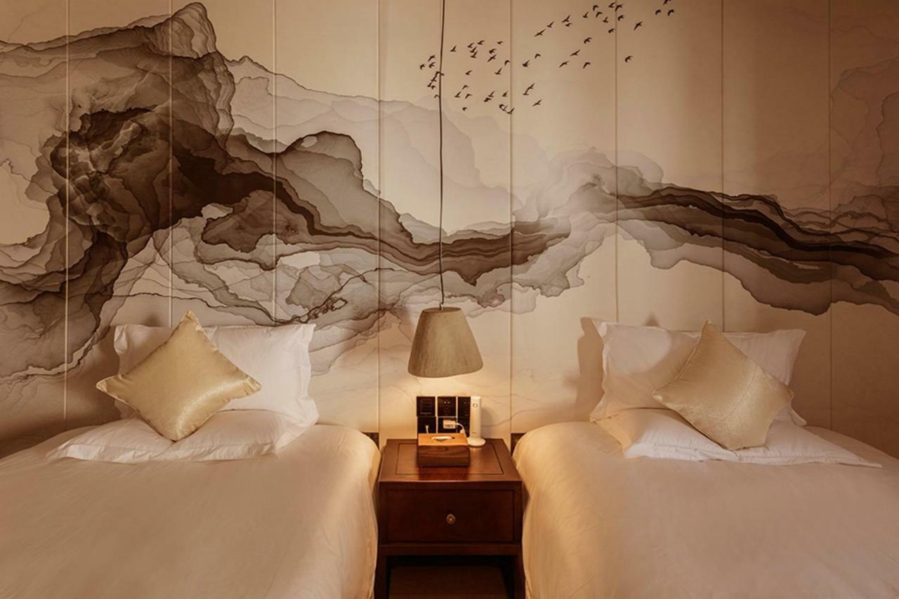 Lijiangl Hotel Liman Shenmiji Inn 麗江市 エクステリア 写真